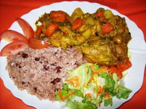 Curry Chicken Dinner with Rice and Peas