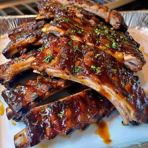 Pork Ribs, BBQ or Honey Garlic (3 Ribs)