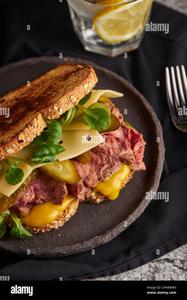 Egg, Meat and Cheese Sandwich on Toast